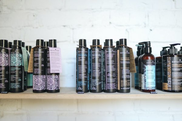 hair products in their containers on shelves